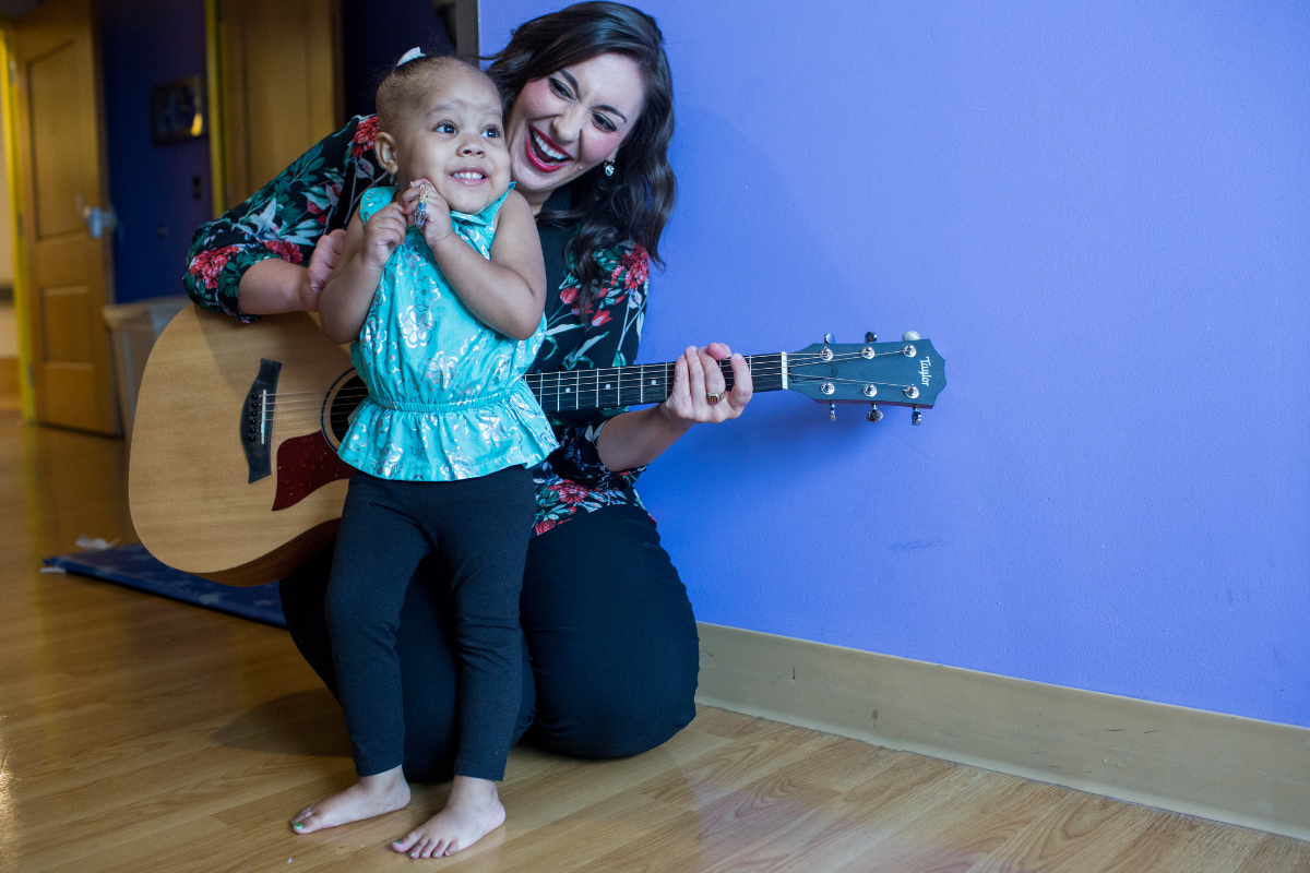 Music Therapist Kory with a Patient