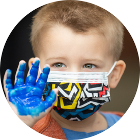 Kid with Blue paint on his hand